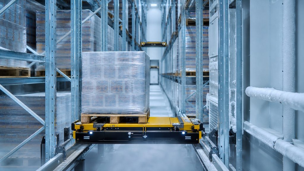 Four-way shuttle robot operating in a frozen cold storage warehouse